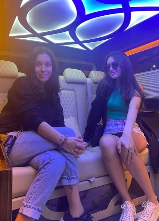 Happy Side Taxi customers in a VIP van